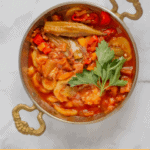 Vegan vegetable stew in traditional Turkish copper pan