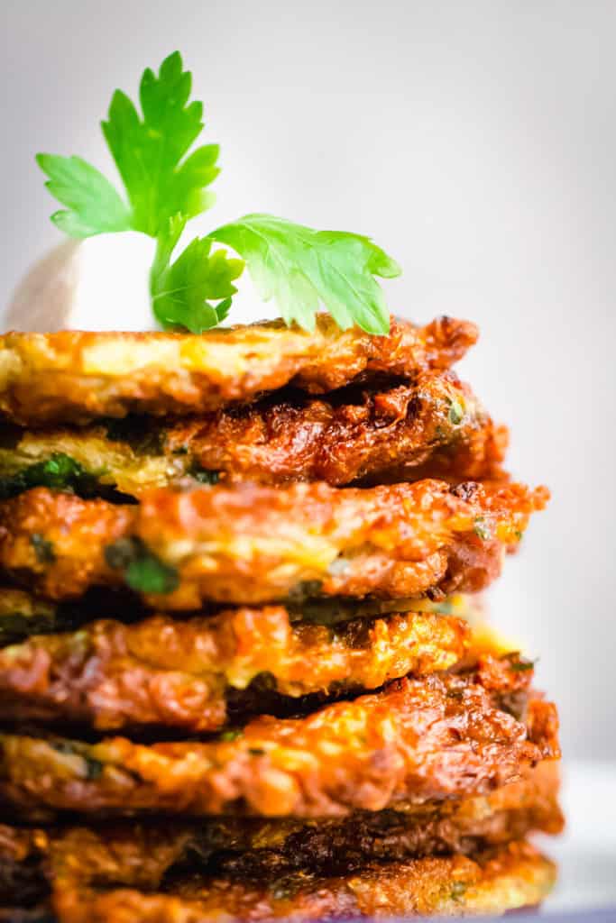 These vegan zucchini fritters are a great way to sneak in more veggies! A true Mediterranean treasure from my childhood, this plant-based version is easy to make and so delicious.