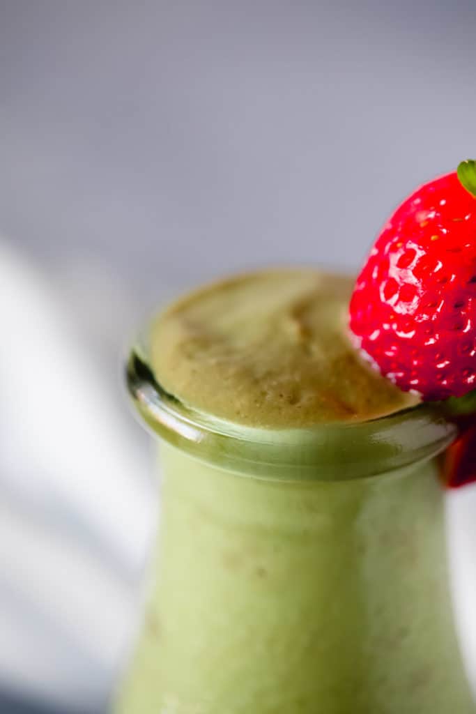 This refreshing, immune-boosting smoothie recipe is packed with anti-inflammatory ingredients like flax seeds, spinach, ginger, and turmeric