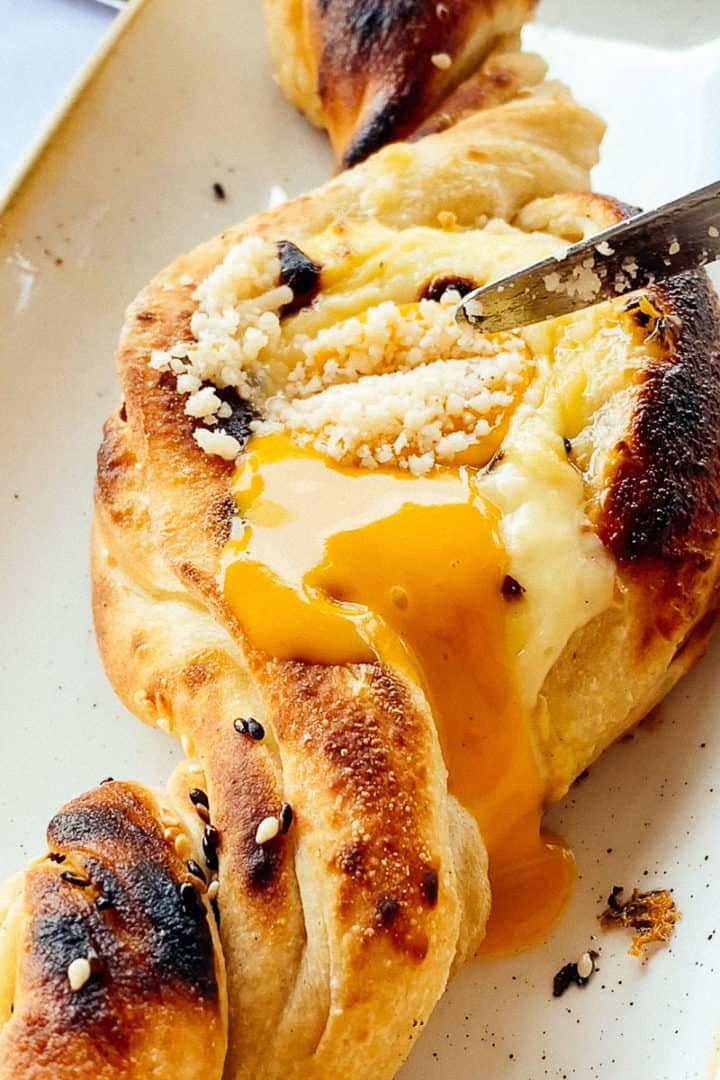 vegan egg yolk running down khachapuri