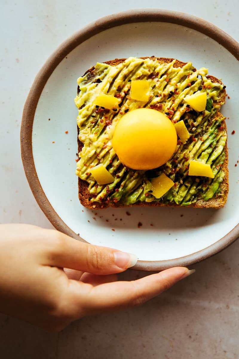 egg yolk on vegan avocado toast