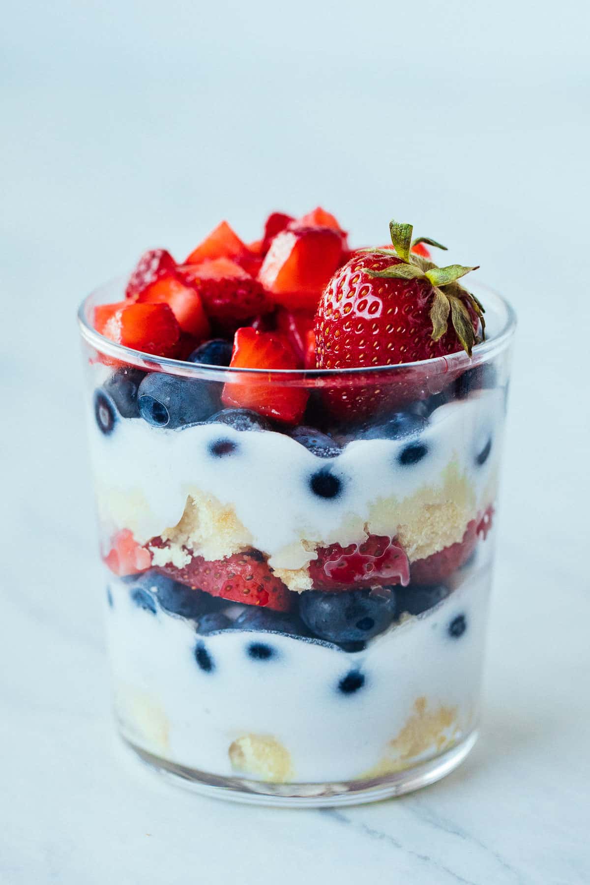 trifle cup in a glass with berries