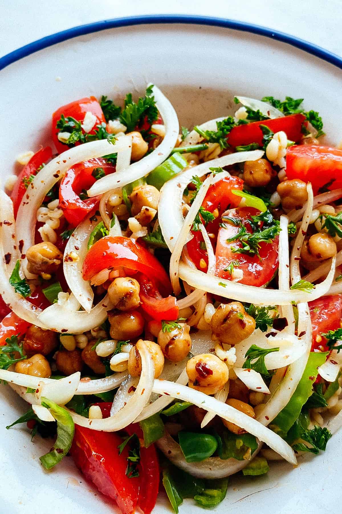top view of spicy chickpea and bulgur salad in a bowl