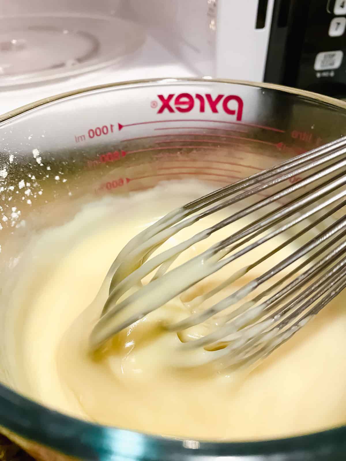 vegan microwave pastry cream being whisked